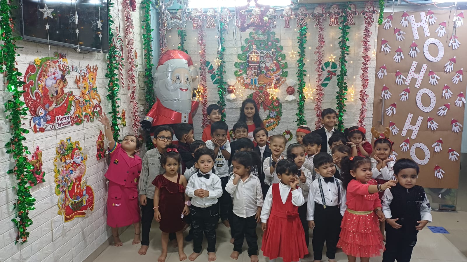 Children in party wear at the Christmas celebration
